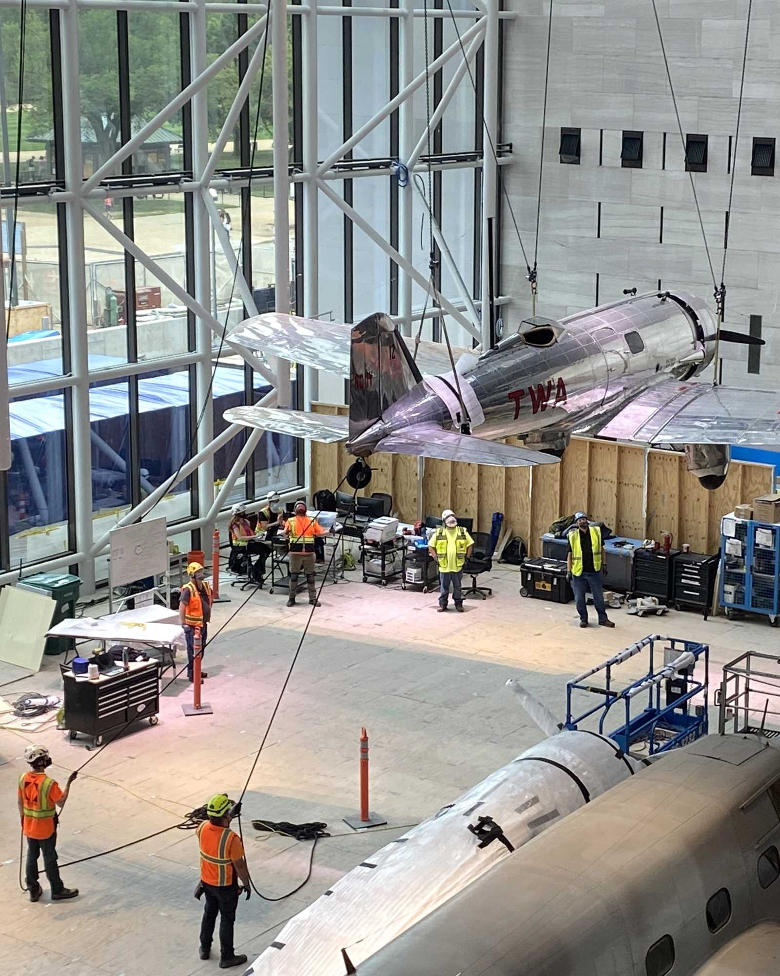 An aircraft being rigged into position. My role was to verify final artifact hanging points on truss steel.